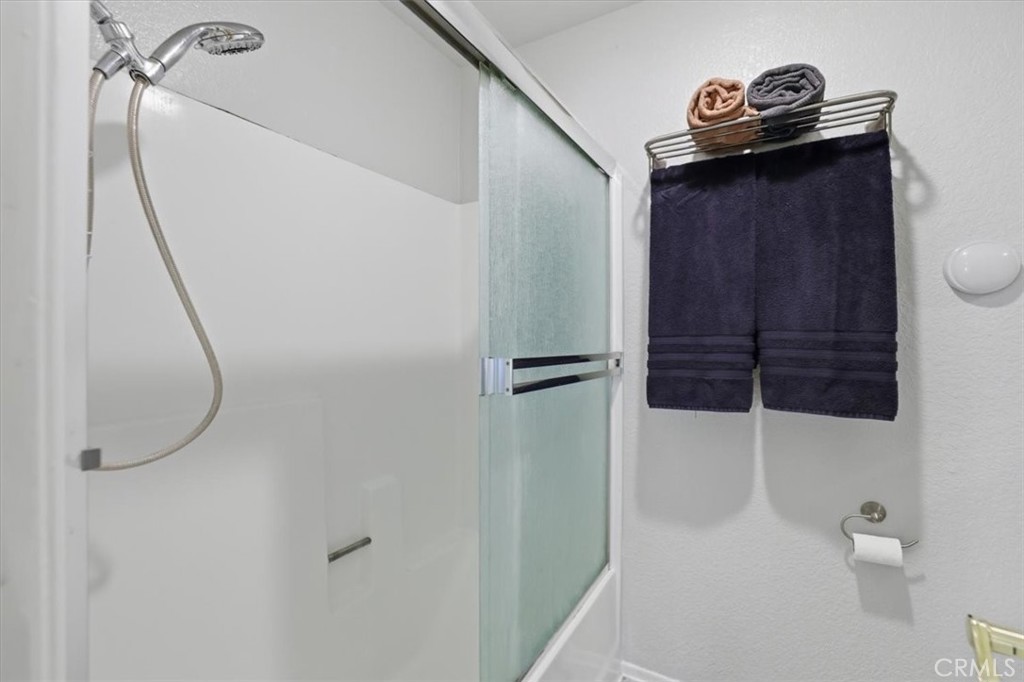 9743 La Jolla Drive, Unit D Rancho Cucamonga, CA 91701 - Photo 25 of 40 a bathroom with a shower