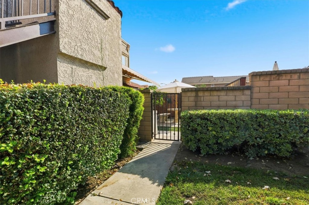 9743 La Jolla Drive, Unit D Rancho Cucamonga, CA 91701 - Photo 3 of 40 a view of a garden