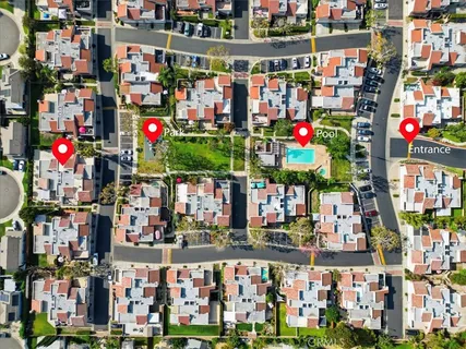 a view of a city with mountains in the background