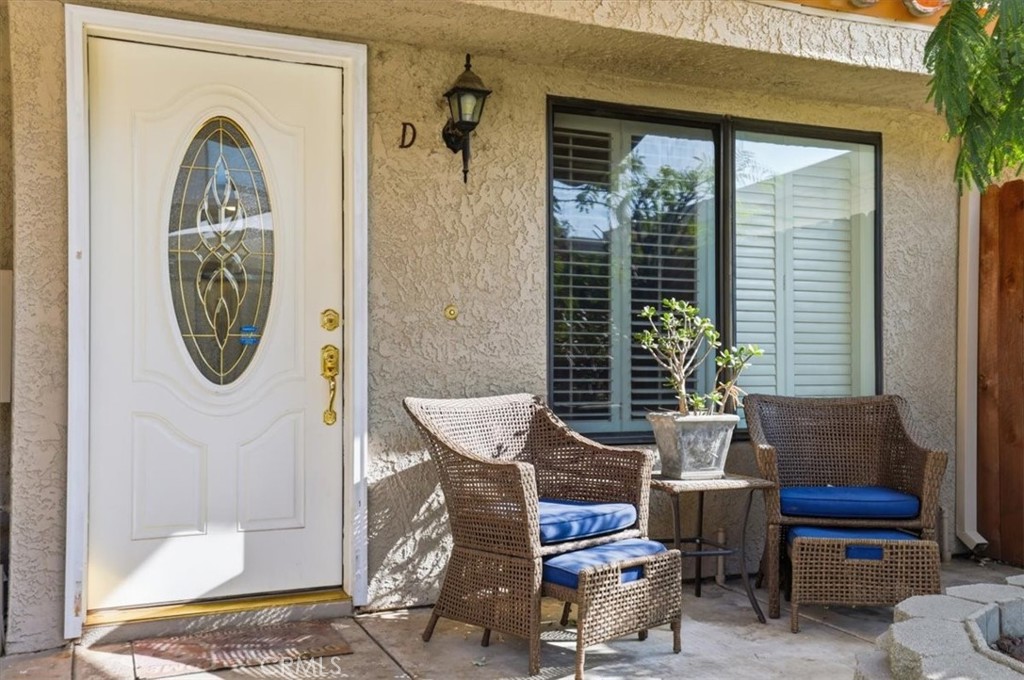 9743 La Jolla Drive, Unit D Rancho Cucamonga, CA 91701 - Photo 6 of 40 a room with furniture and a window