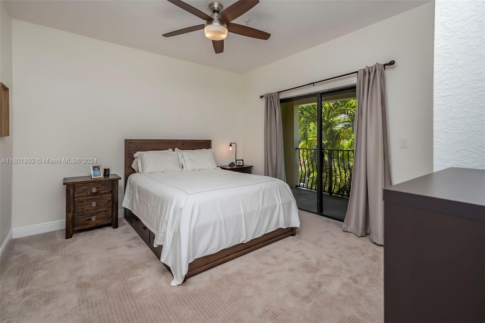 3204 Bird Avenue, Unit 109 Miami, FL 33133 - Photo 23 of 67 a large bed sitting in a bedroom next to a window