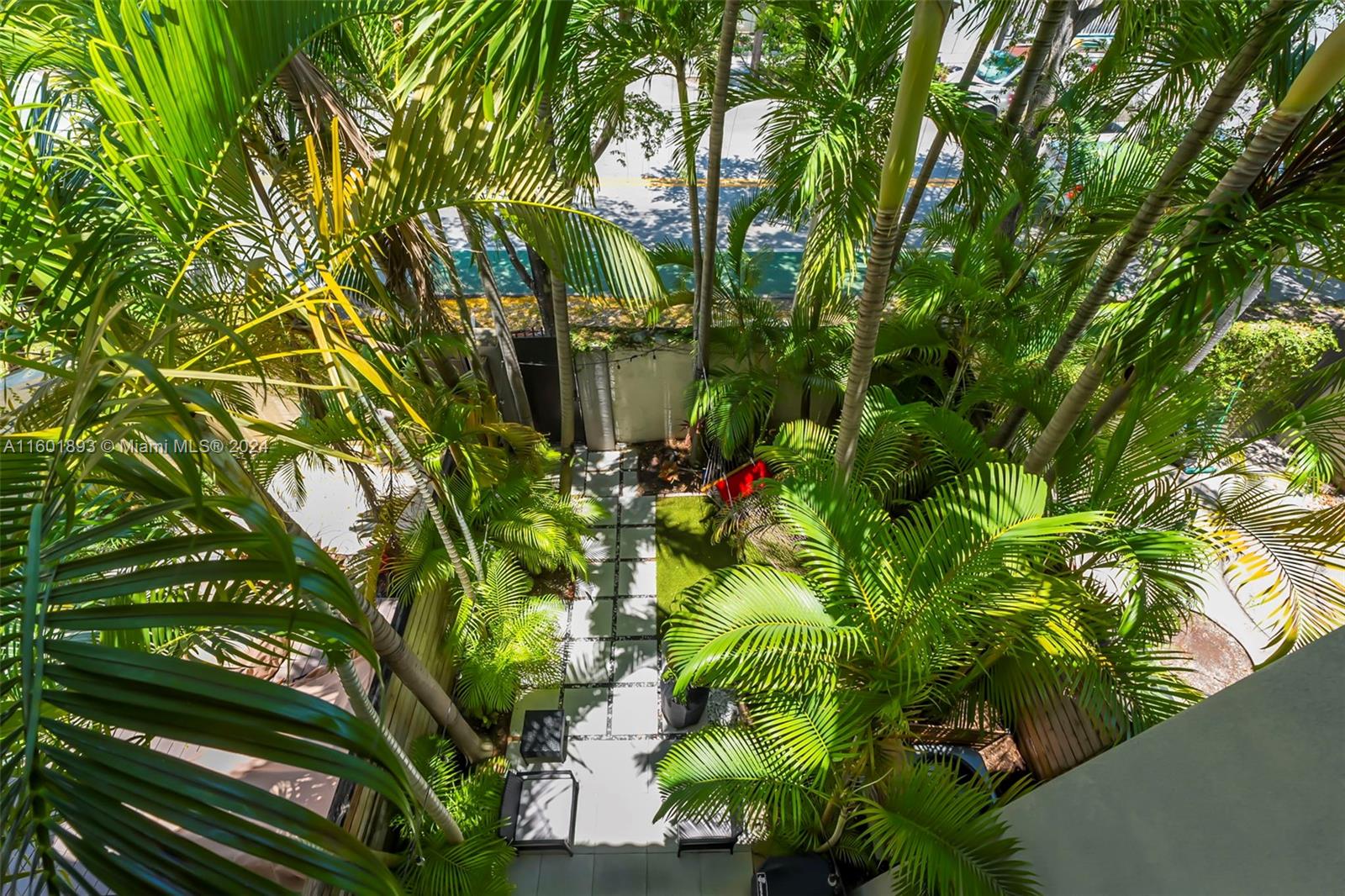 3204 Bird Avenue, Unit 109 Miami, FL 33133 - Photo 37 of 67 a view of a plant in a garden