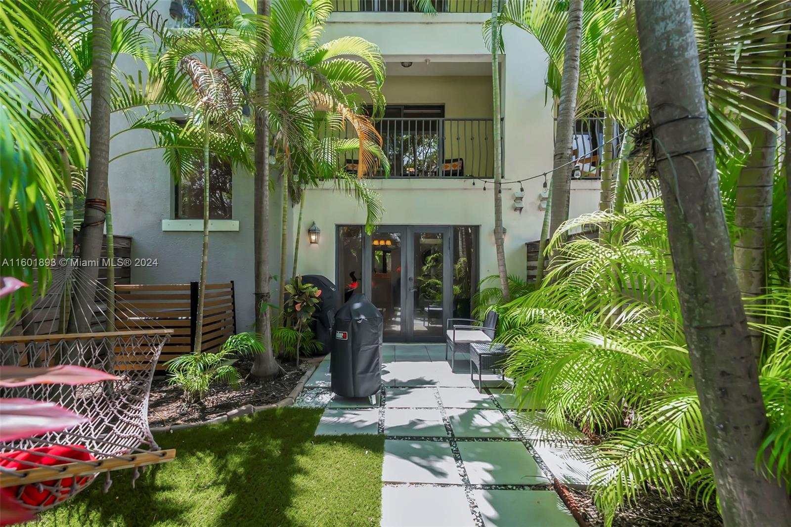 3204 Bird Avenue, Unit 109 Miami, FL 33133 - Photo 40 of 67 a front view of a house with garden