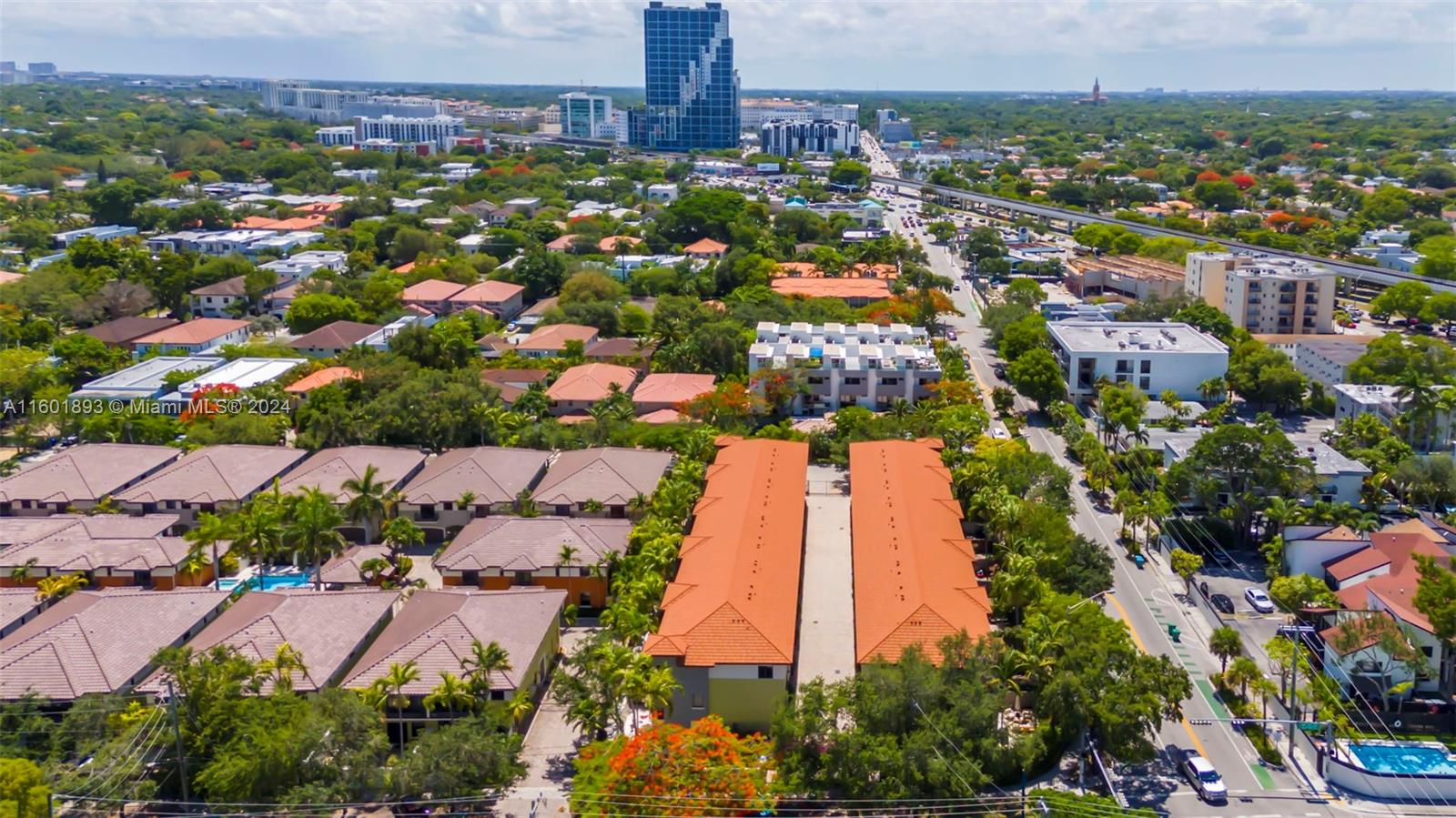 3204 Bird Avenue, Unit 109 Miami, FL 33133 - Photo 56 of 67 an aerial view of residential building and lake