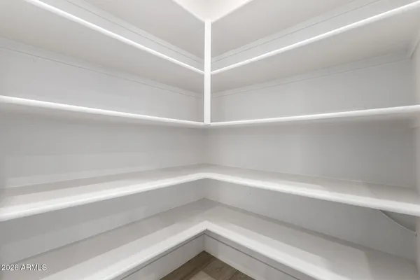 a view of an empty walk in closet