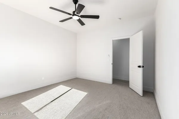 a bathroom with a shower and a shower