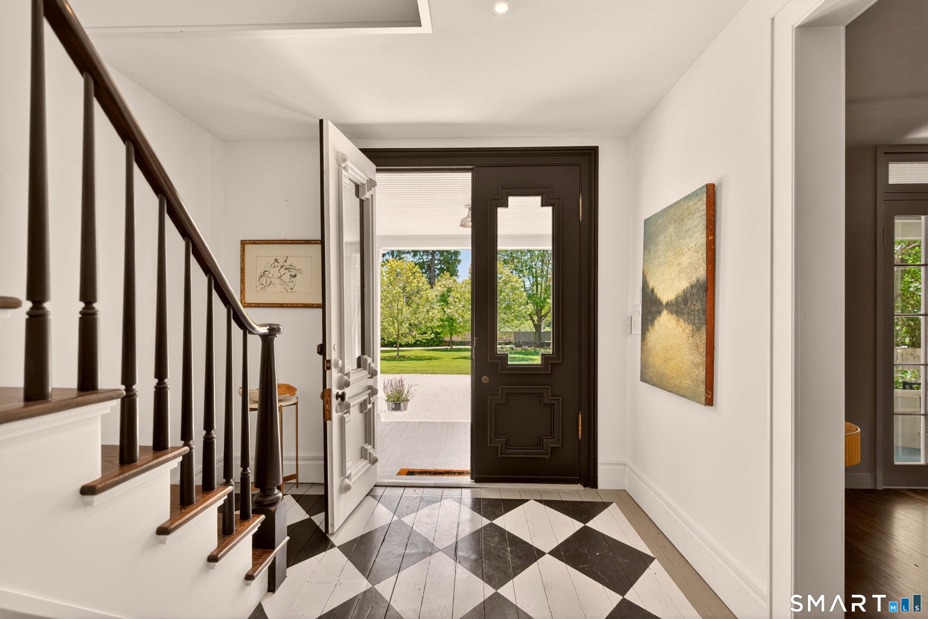 100 North Main Street Kent, CT 06757 - Photo 10 of 40 a view of a hallway with wooden floor and windows