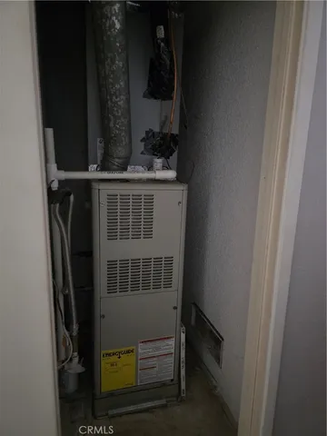 a bathroom with a toilet a sink and a mirror