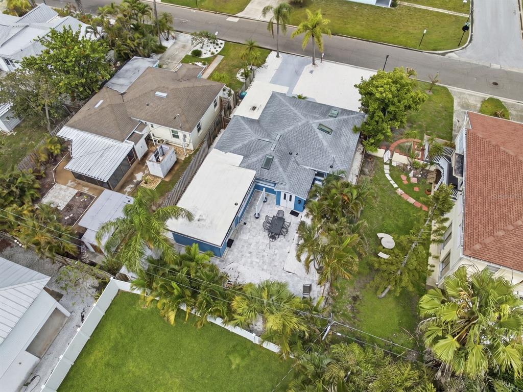 1207 1st Street Indian Rocks Beach, FL 33785 - Photo 54 of 60 an aerial view of a house with a garden