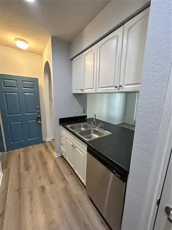 a view of a living room and bathroom
