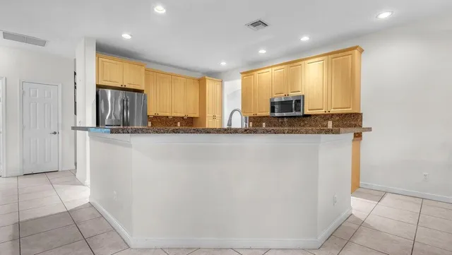 a view of a kitchen with a stove