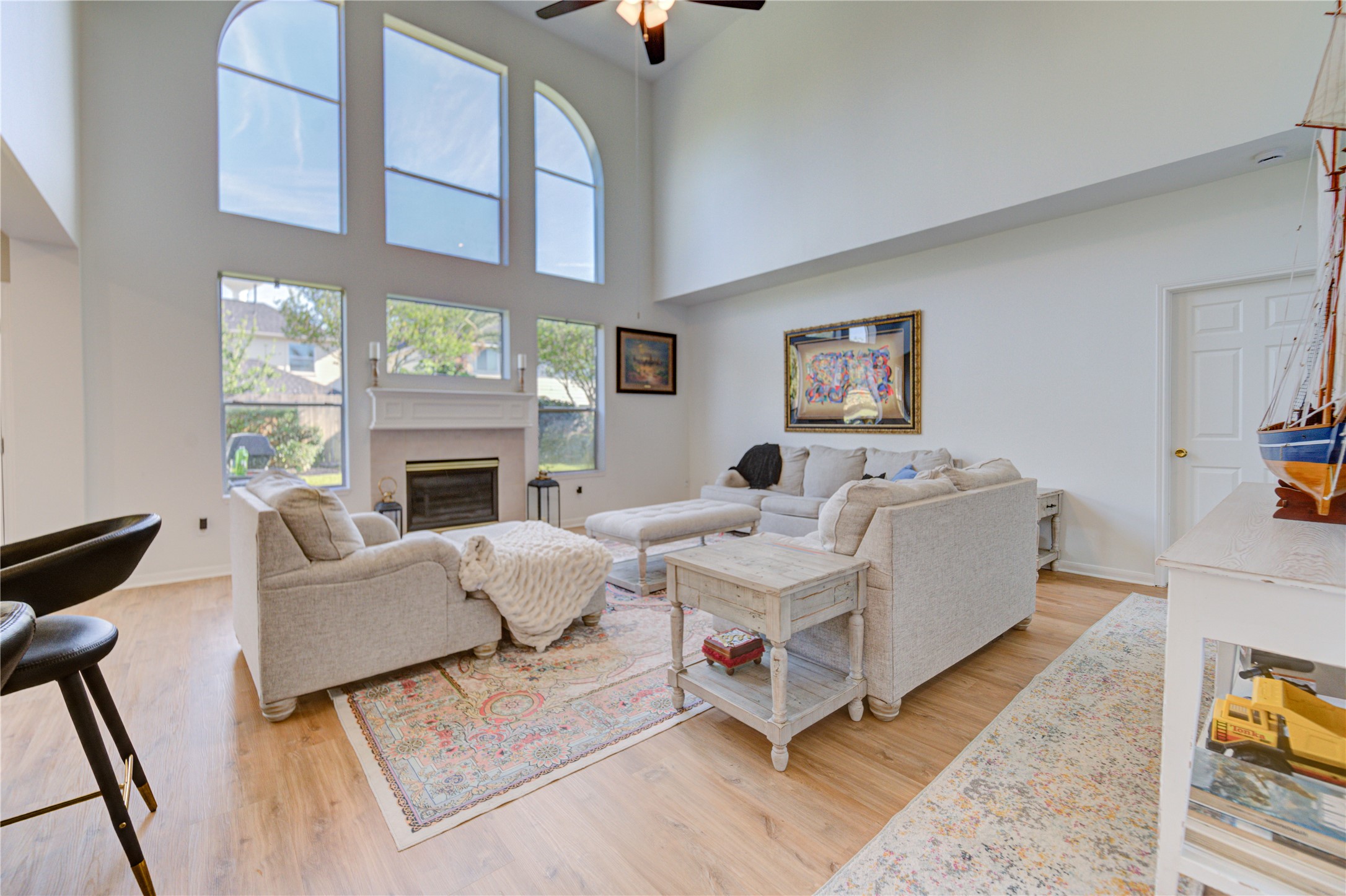 10906 Trail Ridge Drive Houston, TX 77064 - Photo 18 of 41 Spacious living area with high ceilings, creating an open and airy feel filled with natural light.