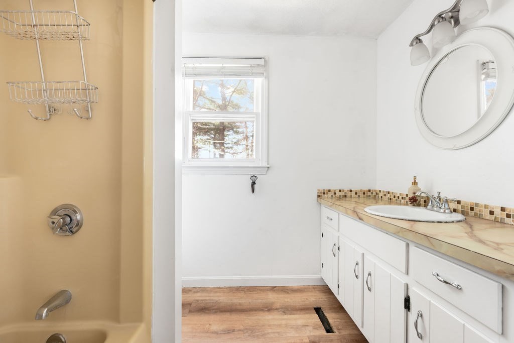 22 Browning Road Shrewsbury, MA 01545 - Photo 24 of 33 a bathroom with a sink and a mirror