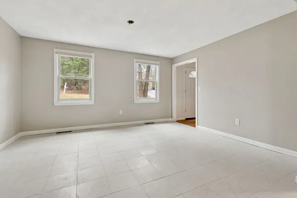 an empty room with windows