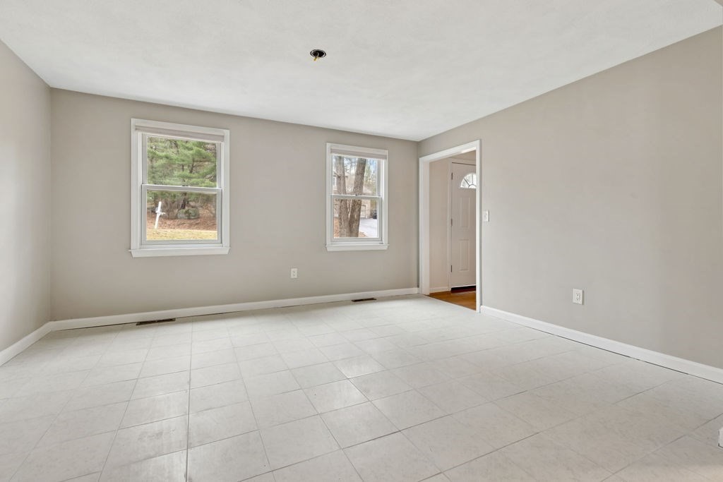 22 Browning Road Shrewsbury, MA 01545 - Photo 8 of 33 an empty room with windows