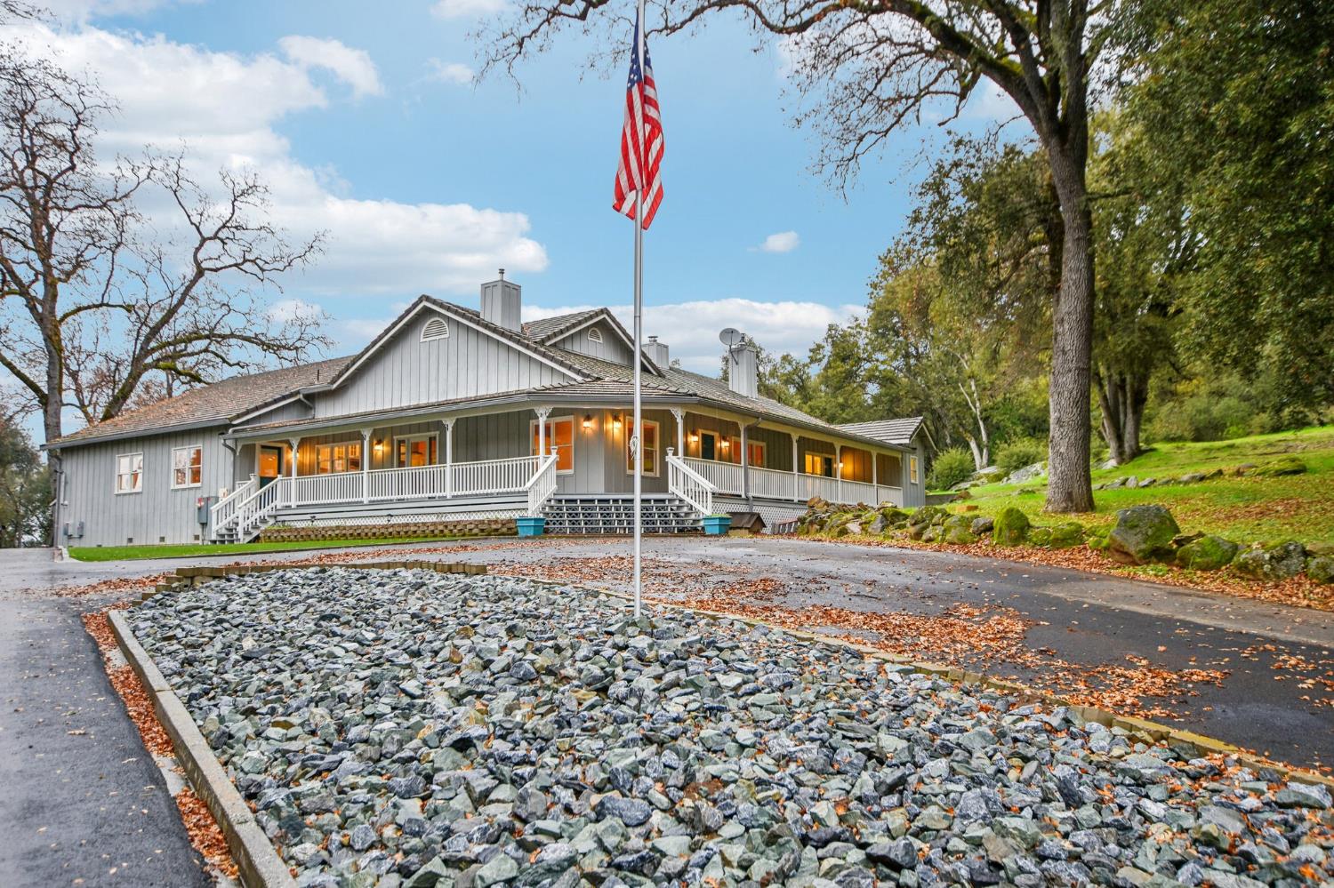 7650 Buzzards Gulch Road Somerset, CA 95684 - Photo 2 of 39 a front view of a house with a yard