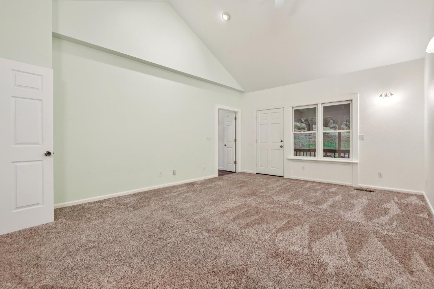 7650 Buzzards Gulch Road Somerset, CA 95684 - Photo 27 of 39 a view of an empty room with a window