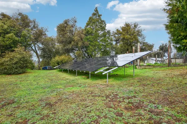 a backyard of a house with lots of green space