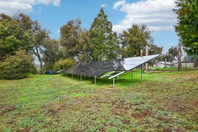 a backyard of a house with lots of green space