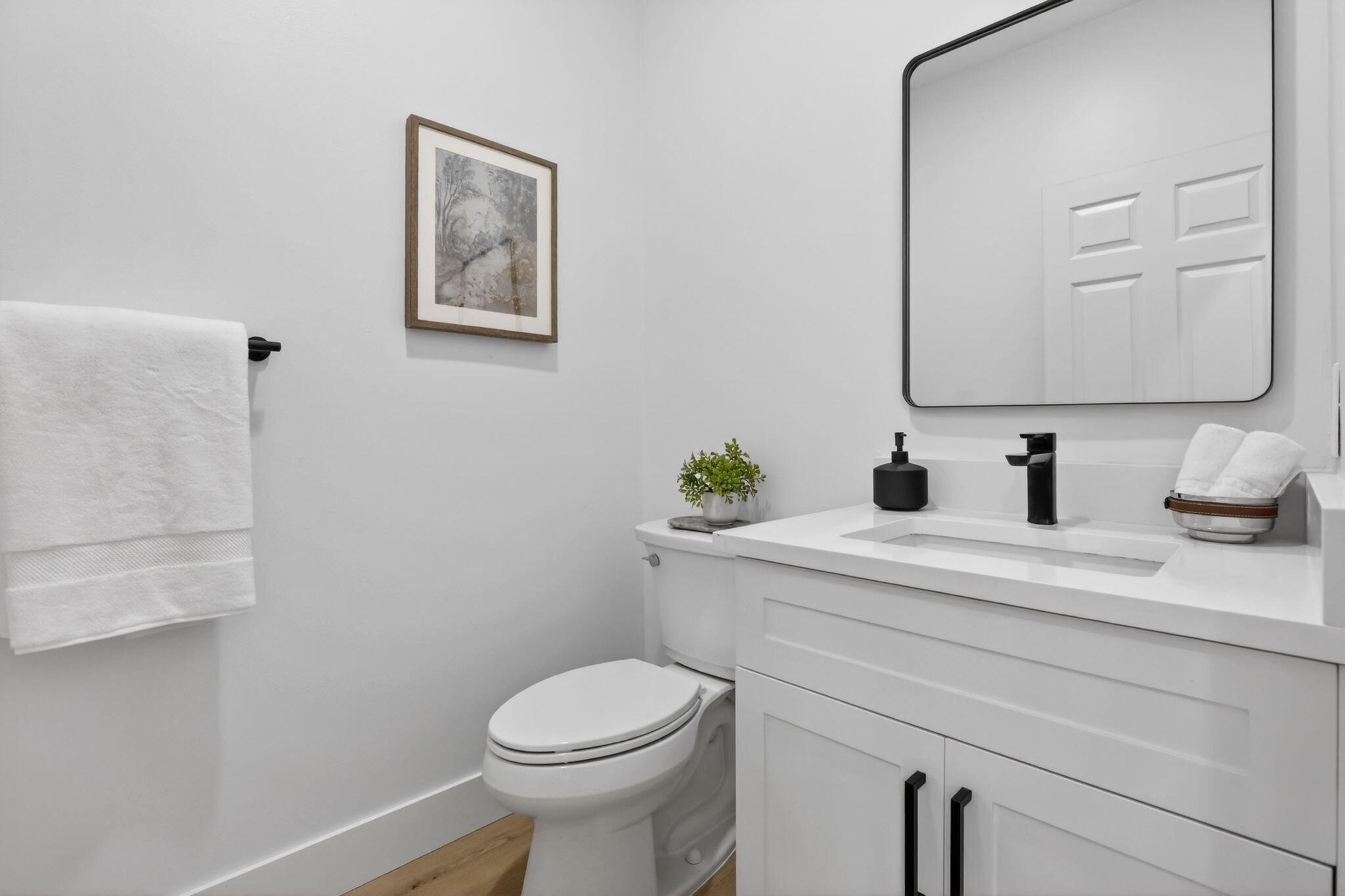 4299 Laurel Ridge Circle Weston, FL 33331 - Photo 66 of 103 a bathroom with a sink a toilet and mirror