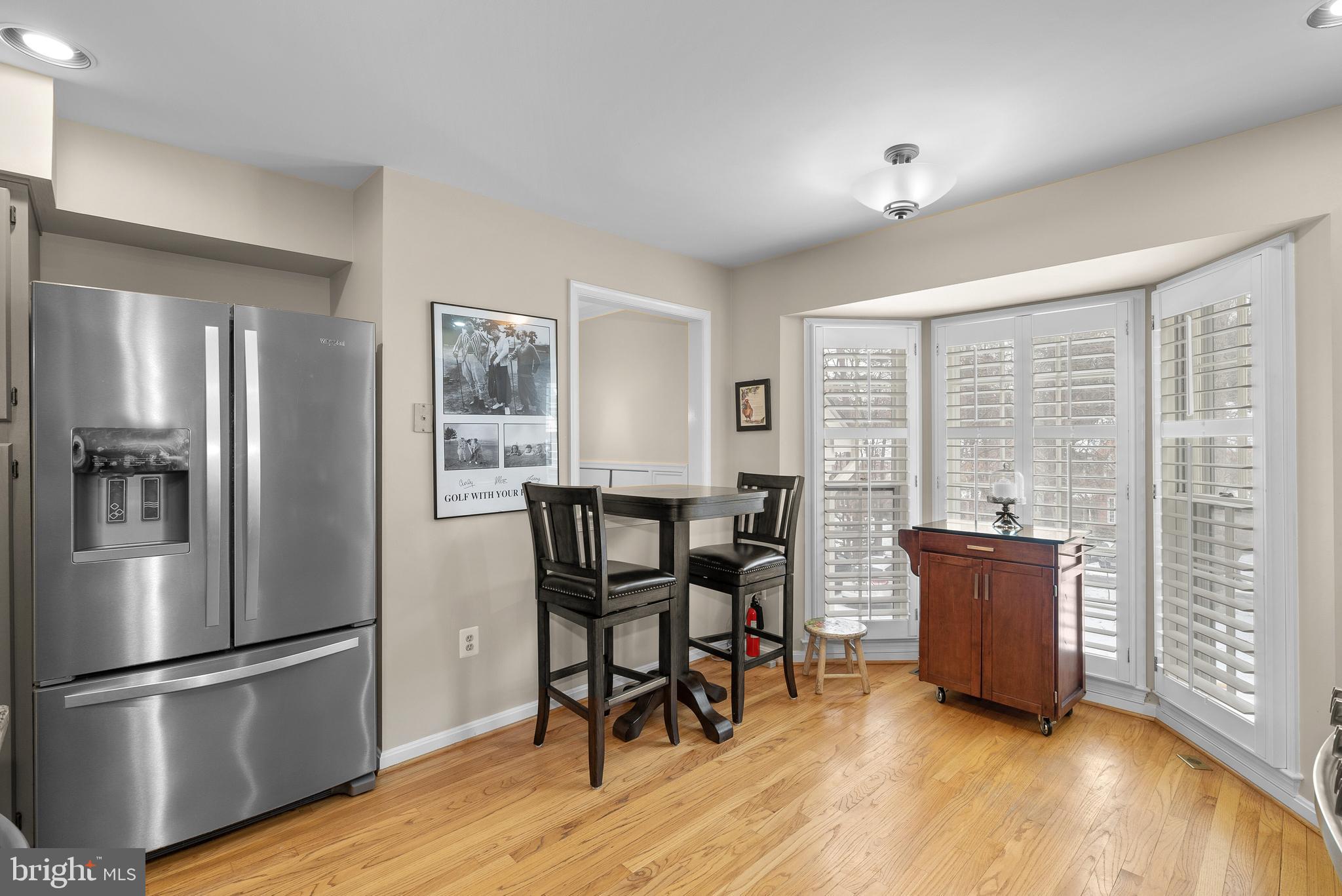 11713 Great Owl Circle Reston, VA 20194 - Photo 12 of 43 Eat In Kitchen Feat. Bright Bay Window w/ Shutters
