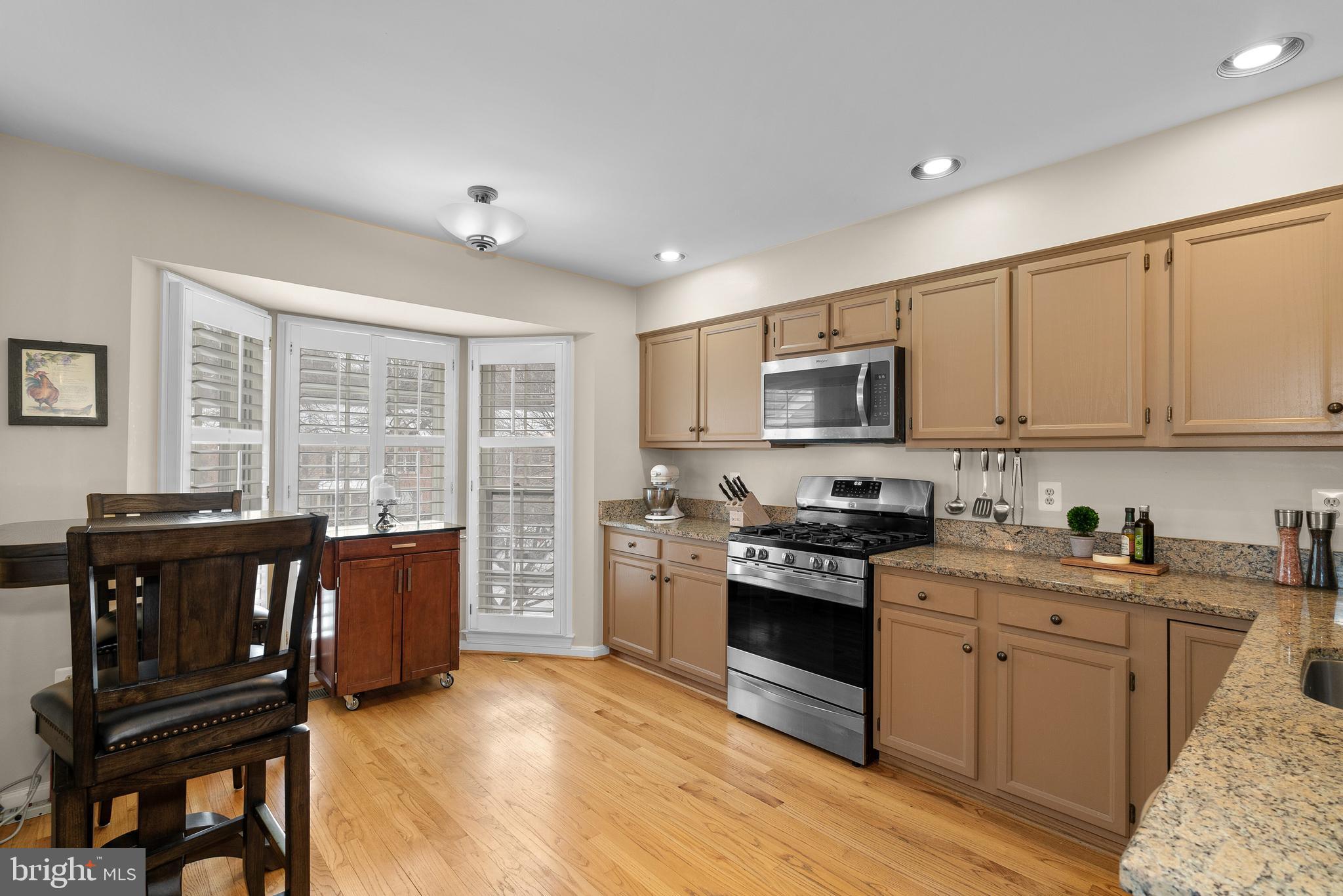 11713 Great Owl Circle Reston, VA 20194 - Photo 14 of 43 Recessed Lights, Pantry, Wood Shutters