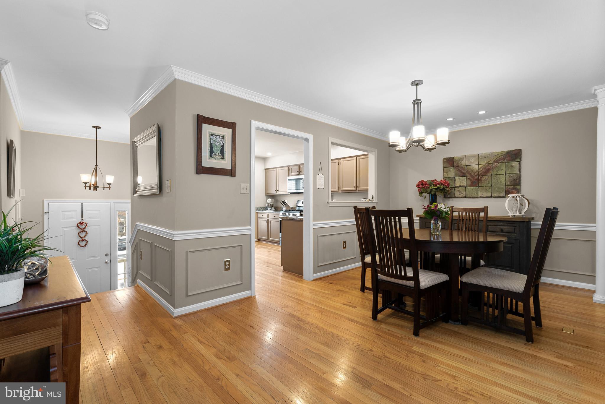 11713 Great Owl Circle Reston, VA 20194 - Photo 4 of 43 Separate Dining Room w/ Gleaming HWFs
