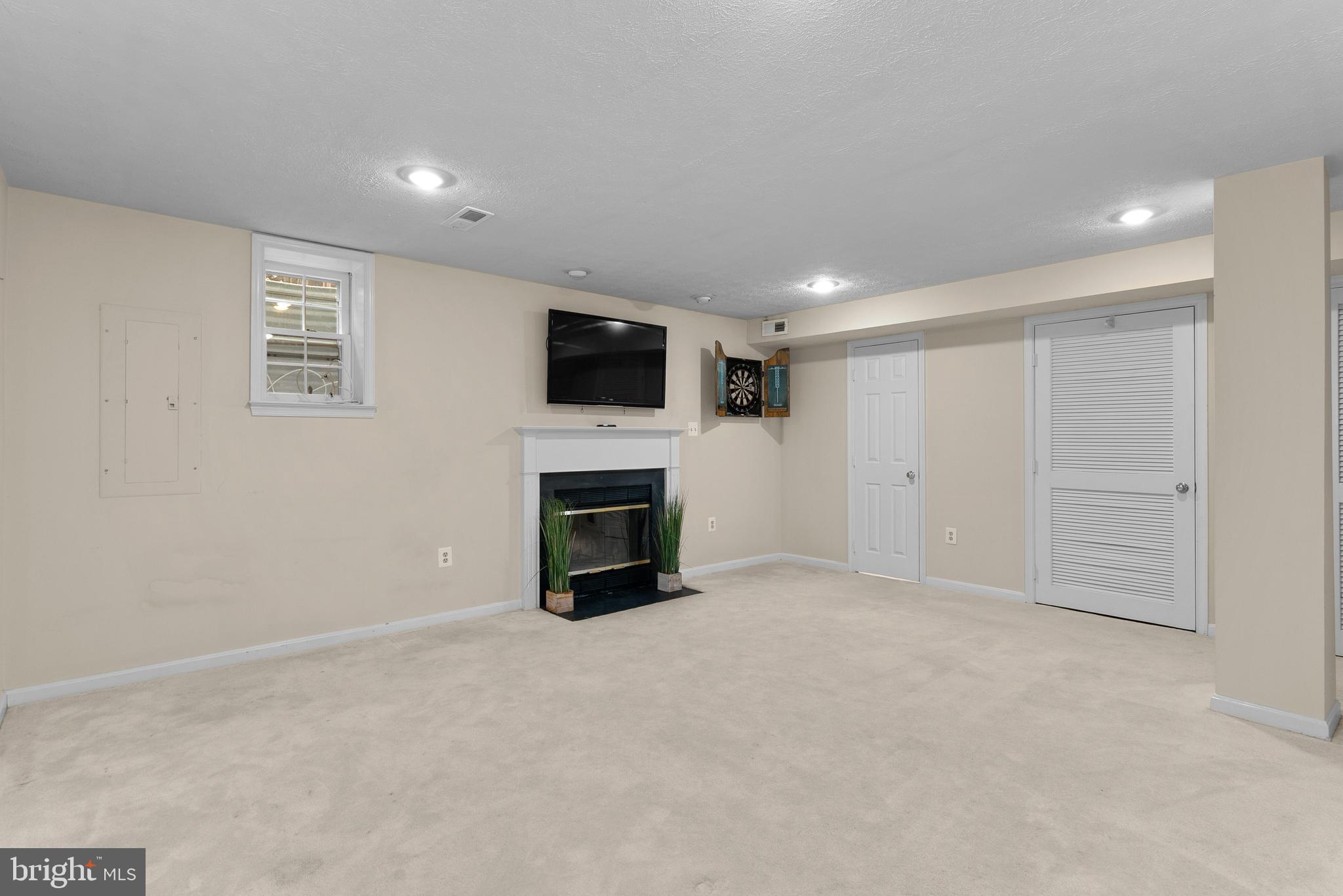 11713 Great Owl Circle Reston, VA 20194 - Photo 33 of 43 Lower Level Rec Room w/ Fireplace #2