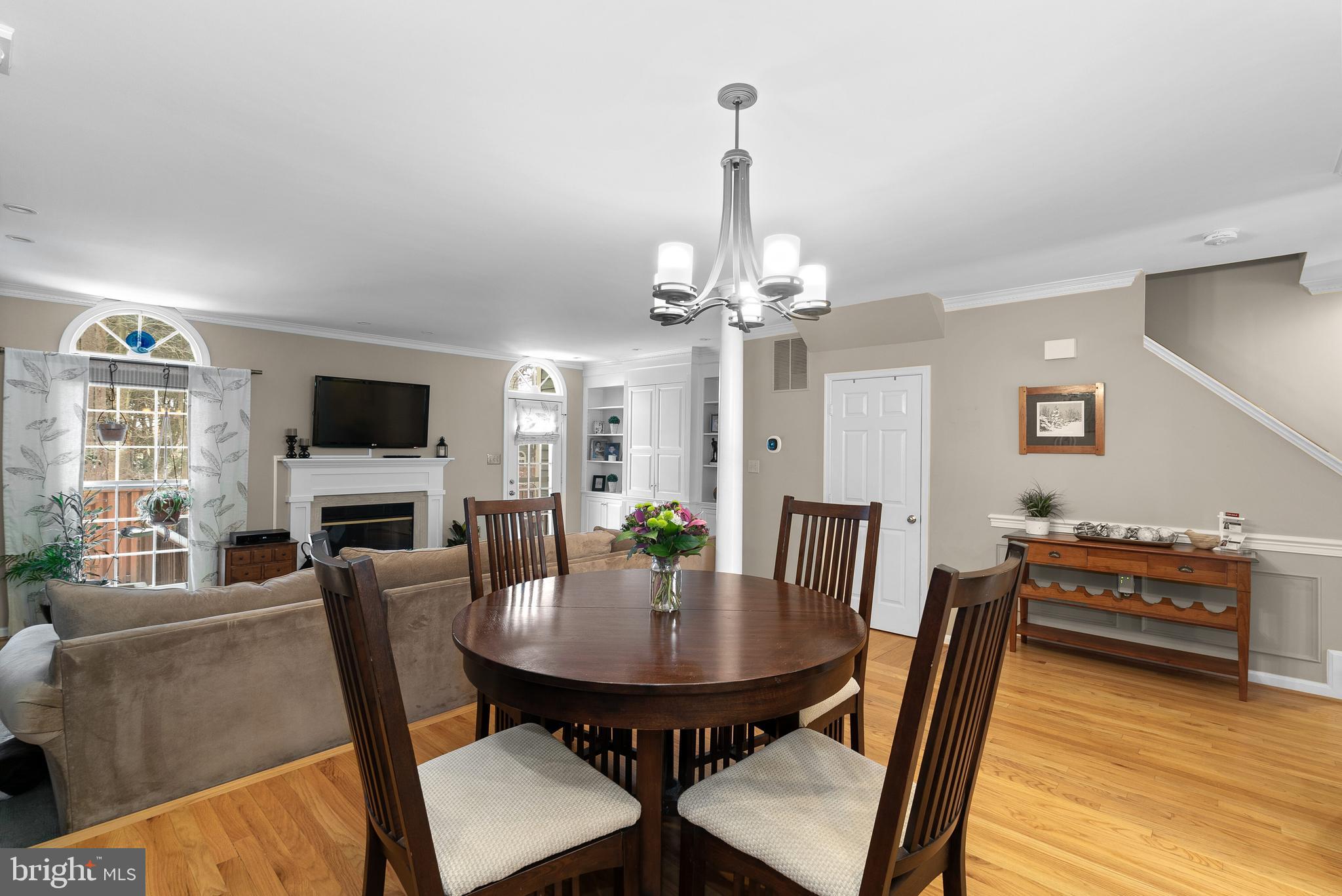 11713 Great Owl Circle Reston, VA 20194 - Photo 8 of 43 Dining Room w/ HWFs Between Kitchen and Living Rm