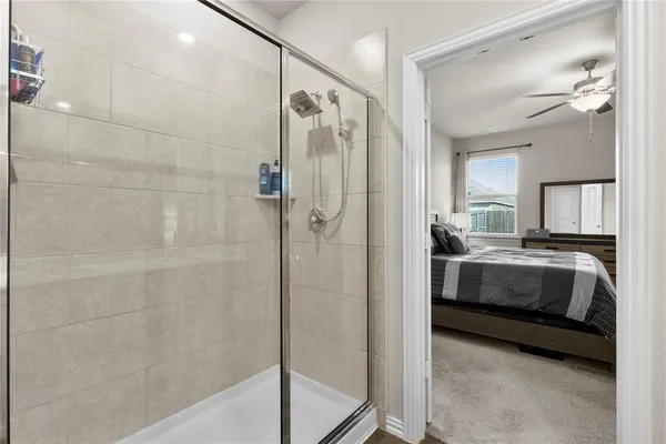 a bathroom with a double vanity sink and mirror