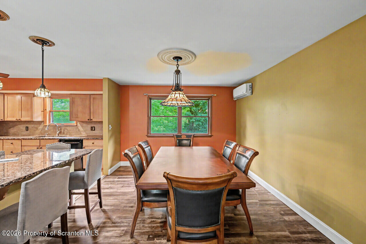 211 Buckingham Street Moscow, PA 18444 - Photo 20 of 83 a dining room with furniture and window