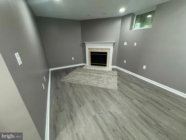 a stove top oven sitting inside of a kitchen