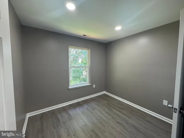a bathroom with a shower and a toilet