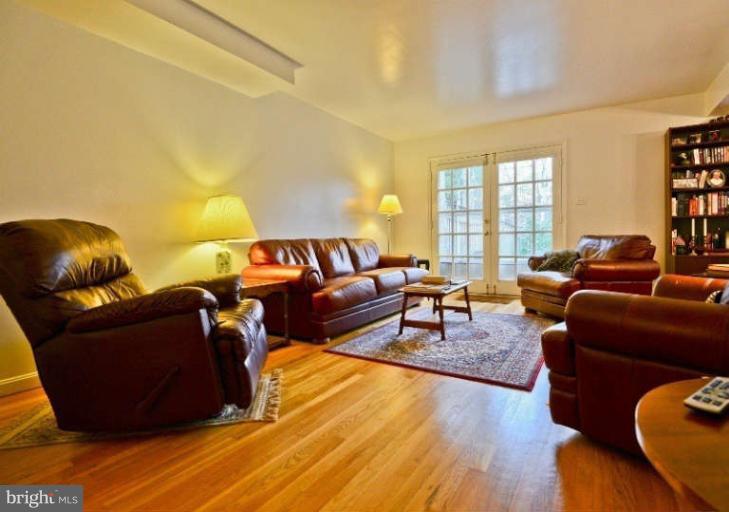9728 Ranger Road Fairfax, VA 22030 - Photo 5 of 22 Living Room opens to patio area