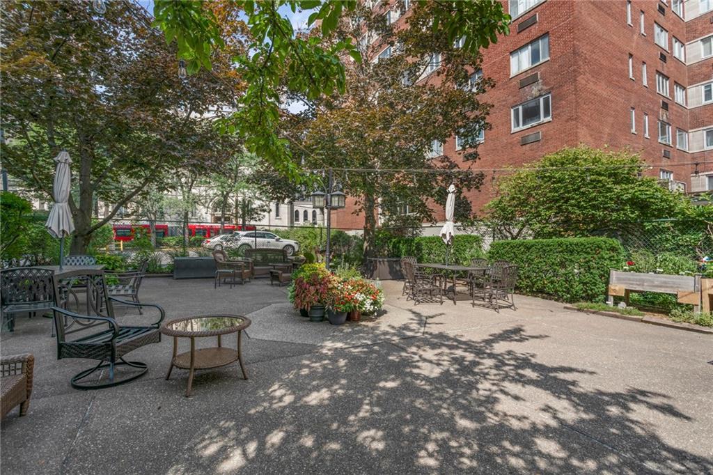 4601 Fifth Avenue, Unit 525 Pittsburgh, PA 15213 - Photo 21 of 35 a view of a backyard with sitting area and furniture