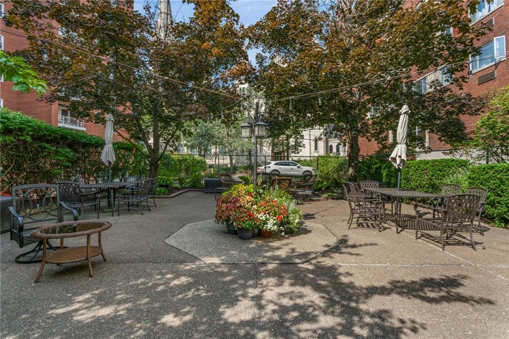 4601 Fifth Avenue, Unit 525 Pittsburgh, PA 15213 - Photo 22 of 35 a backyard of a house with outdoor seating