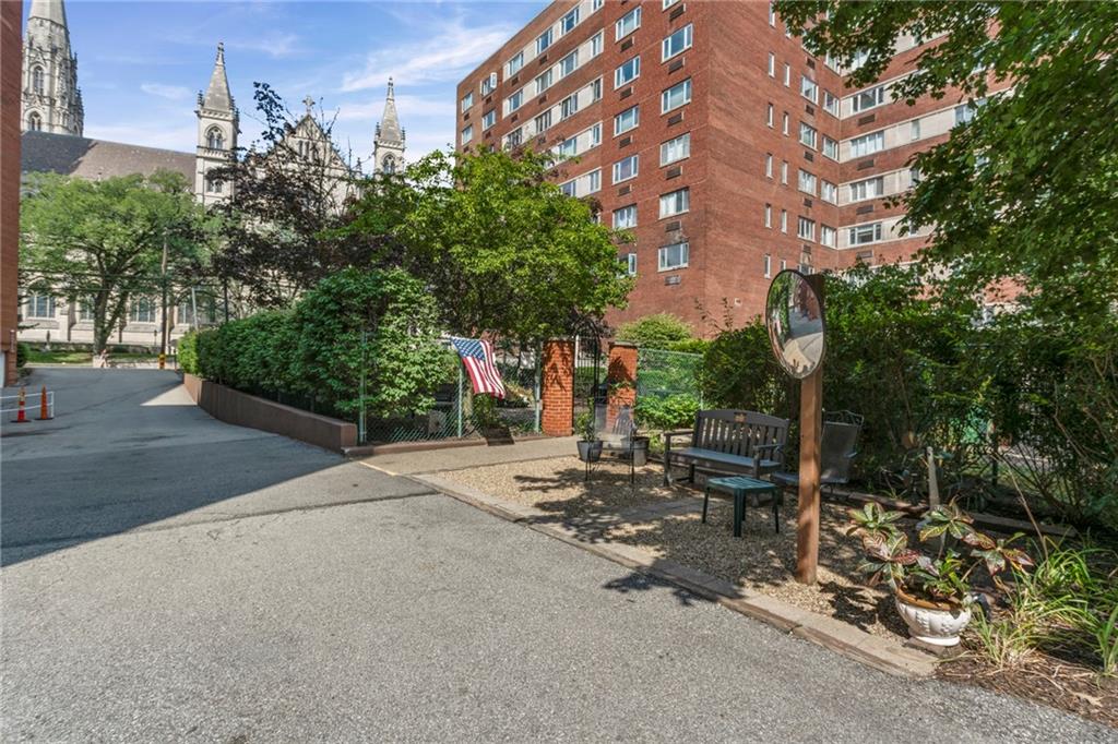 4601 Fifth Avenue, Unit 525 Pittsburgh, PA 15213 - Photo 35 of 35 a view of a street with potted plants and large trees