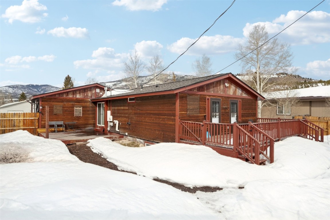 416 Cascade Circle Silverthorne, CO 80498 - Photo 34 of 49 Snow covered property with fence and french doors