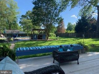 102 Worcester Road Stevensville, MD 21666 - Photo 23 of 38 Deck and View of the newly renovated Tiki Bar