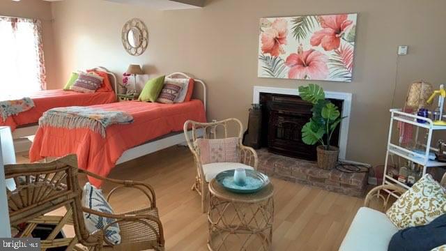 102 Worcester Road Stevensville, MD 21666 - Photo 27 of 38 Entry Level Master Bedroom with Cozy Pellet Stove