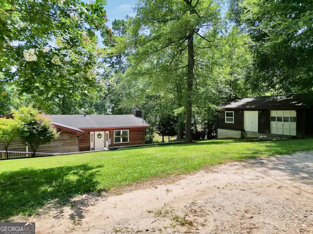 a view of porch with wooden floor