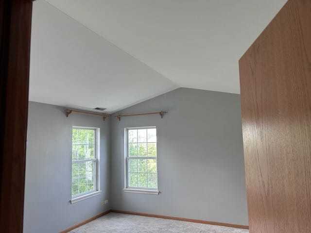 2456 Frost Drive Aurora, IL 60503 - Photo 10 of 12 an empty room with windows