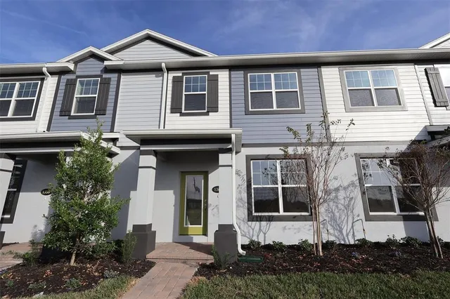 a front view of house with a yard