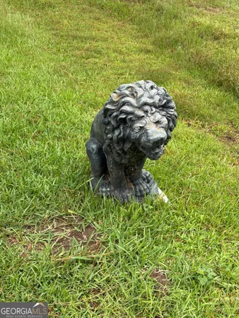 a view of a chairs and table in the patio