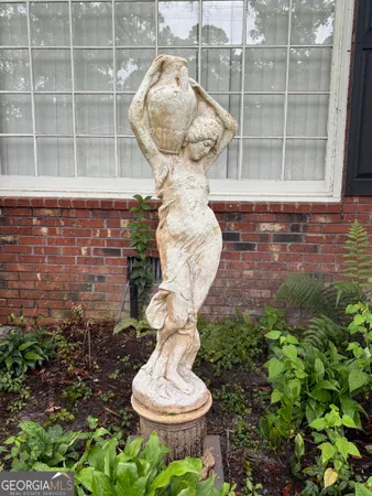 a vase of flowers sitting on a table