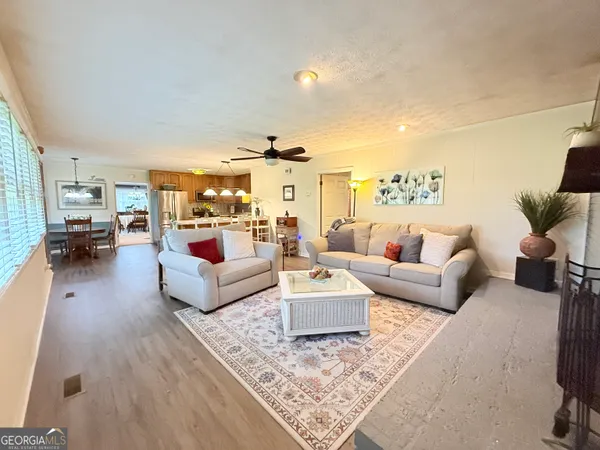 a living room with furniture and a couch