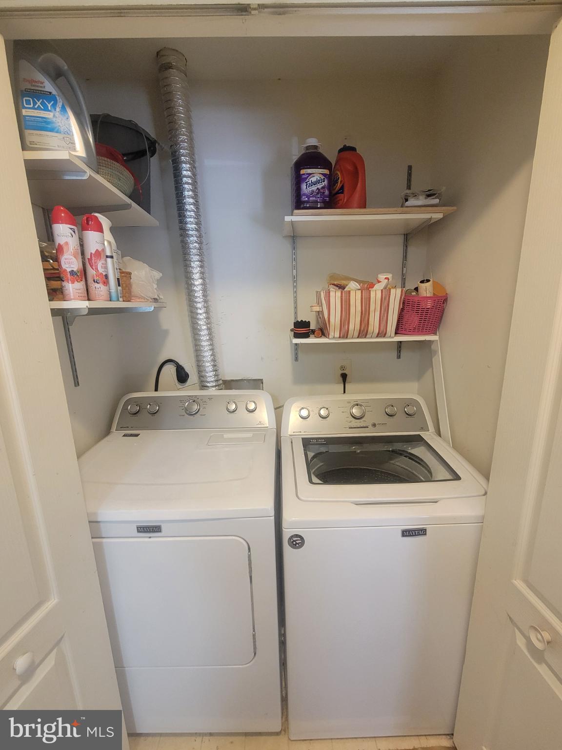 4634 Deepwood Court, Unit 89E Bowie, MD 20720 - Photo 12 of 29 a utility room with dryer and washer