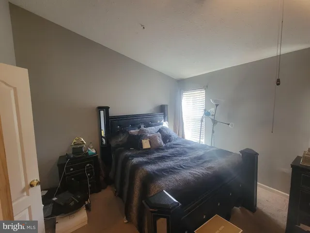 a room with gym equipment and a mirror