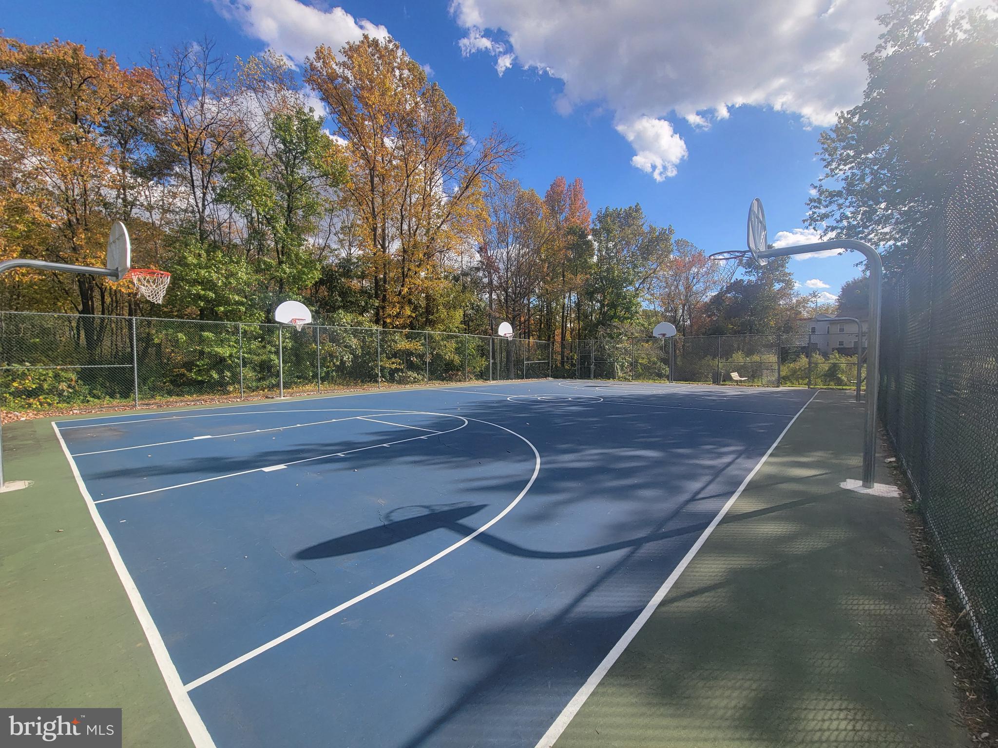 4634 Deepwood Court, Unit 89E Bowie, MD 20720 - Photo 26 of 29 a view of a tennis court