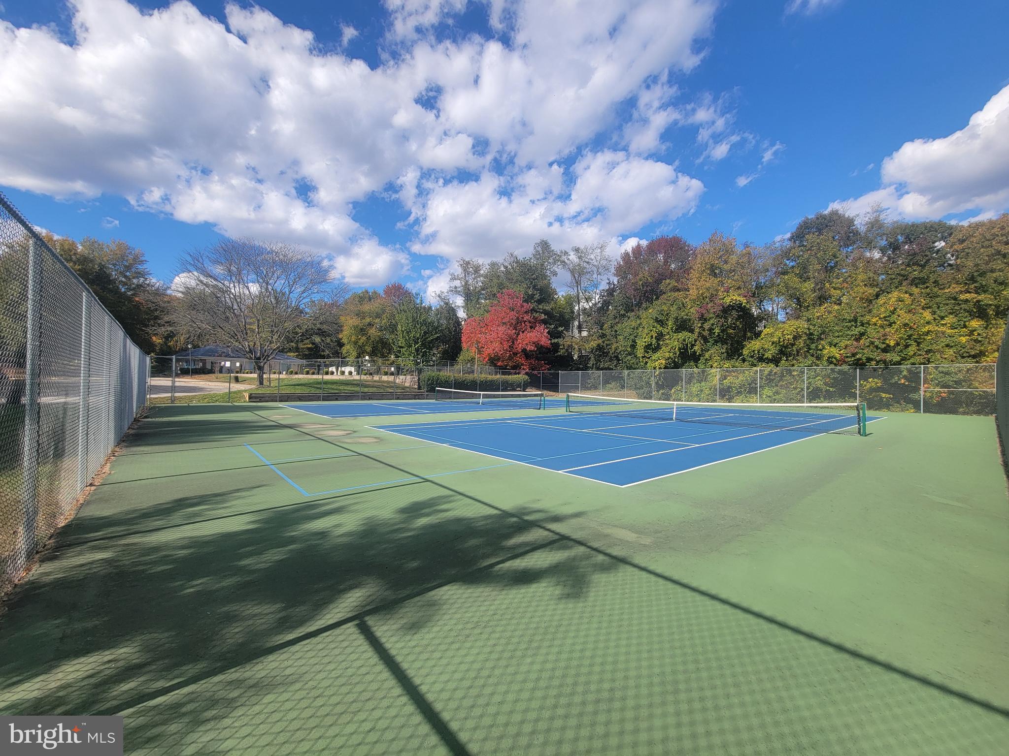 4634 Deepwood Court, Unit 89E Bowie, MD 20720 - Photo 27 of 29 a view of a tennis court